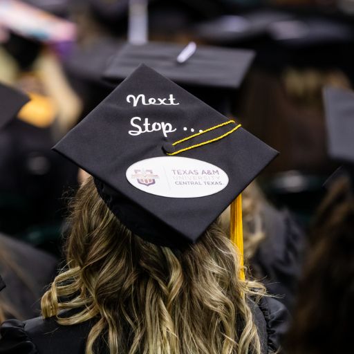 a graduate's mortarboard is decorated with the words, Next Step, Texas A&M Central Texas.